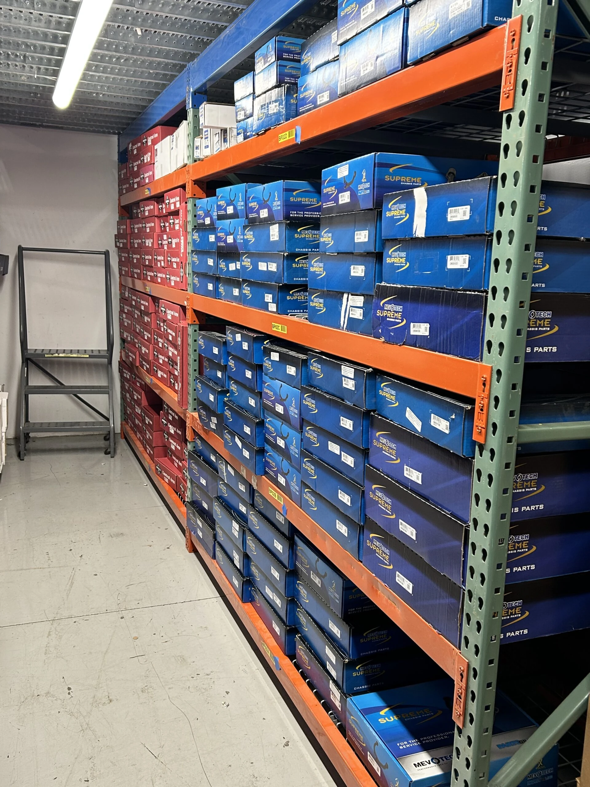 Rows of racks containing auto parts and auto related products that are stocked at the United Auto Supply store in Cicero.