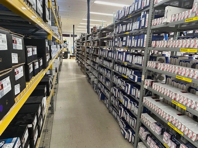 Rows of racks containing auto parts and auto related products that are stocked at the UNited Auto Supply store in Cortland.