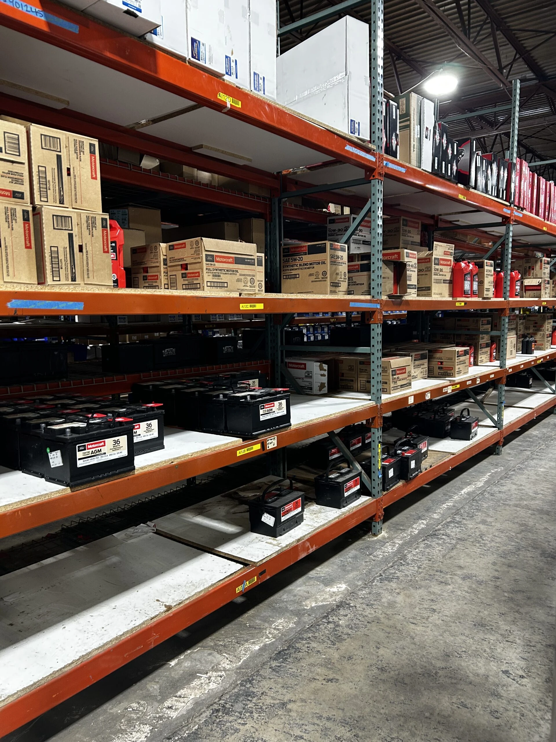 Rows of racks containing auto parts and auto related product that are stocked in United Auto Supply in Buffalo.